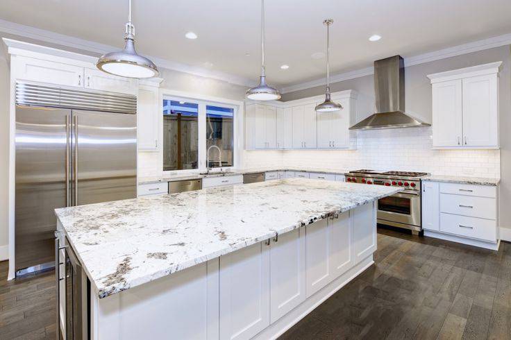 White granite countertop adds a touch of elegance while brightness